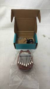 lot 287 image: Kalimba Thumb Piano with Case and Accessories