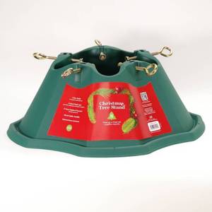 lot 1105 image: Panacea Green Plastic Christmas Tree Stand up to 8ft Indoor Use, 55 lb Capacity, 19.75 Depth, 19.25 Width - Retail $18
