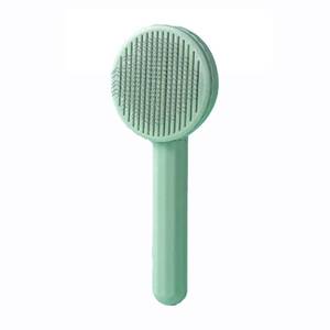 lot 1137 image: Pet Grooming Brush, Massage Comb for Cats and Dogs (green) - Retail $14