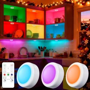 lot 1146 image: Yiliaw 2 Pack LED Puck Lights Remote Control 12 Color Changeable Under Cabinet Lights, Battery Operated Lights Night Light with Dimmer & Timmer for Closet Bedroom Kitchen, White - Retail $12