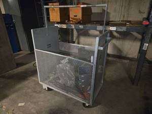 lot 18514 image: Metal Cart on Casters with Various Hardware and metal Squeeze Ringer Inside