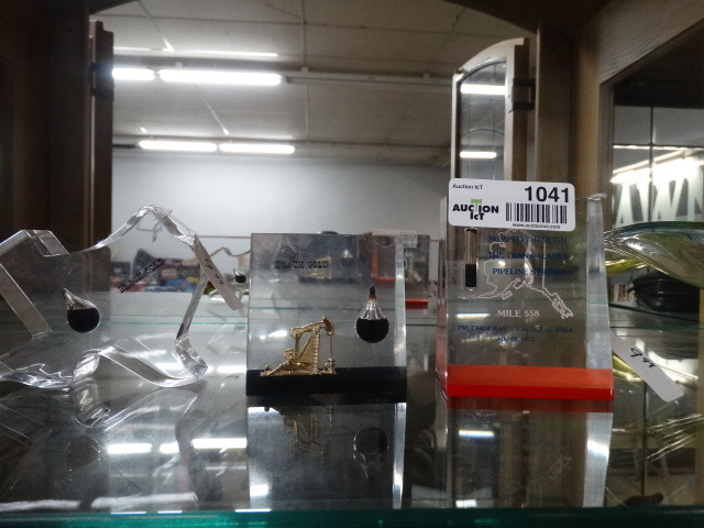 lot 1041 image: 3 Oil in lucite paper weights