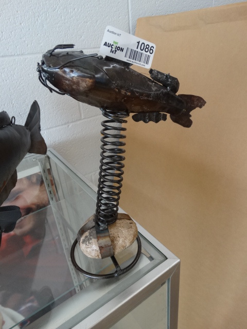lot 1086 image: Small metal yard decor catfish on stand- 9 long x 11 tall