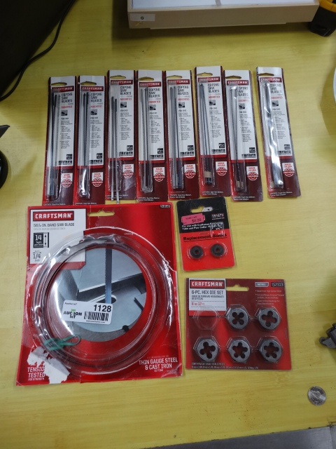 lot 1128 image: Lot of assorted saw blades and 5-piece die set