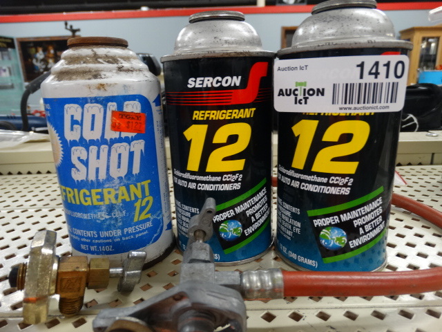lot 1410 image: 3 cans of R12 & gauges