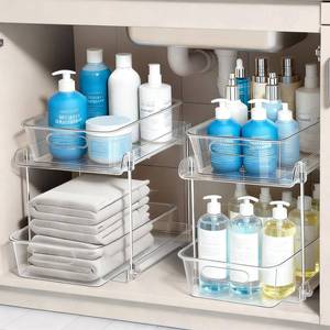 lot 38302 image: 2 Tier Under Sink Organizer Bathroom Organizers and Storage, Clear Stackable Bathroom Cabinet Organizer, Multipurpose Pull-Out Home Organizer for Kitchen and Pantry Storage 2 Pack - Retail $25