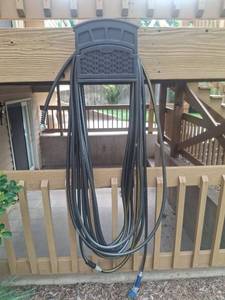 lot 1011 image: 2 Garden Hose with Hanger