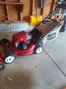 lot 1003 image: Toro Recycler Lawn Mower with Bagger and Attachments