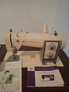 lot 1054 image: Kenmore Model 54 Automatic Zig-Zag Sewing Machine - In Basement