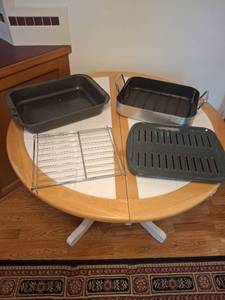 lot 1120 image: 4-Piece Roasting Pan and Rack Set with Broiler Pan and Roast Rack