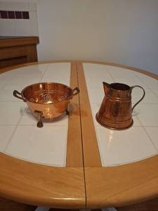 lot 1123 image: Two copper kitchen pieces - colander and pitcher