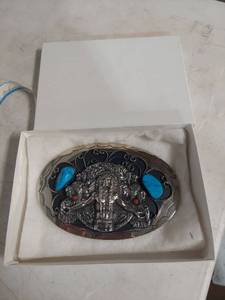 lot 2004 image: Indian with Open Arms Belt Buckle with Turquoise and Coral Stone Inlay