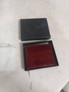 lot 2038 image: Red Leather Bifold Wallet with Black Gift Box