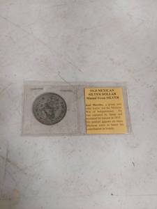 lot 2045 image: Old Mexican Silver Dollar