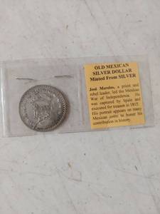 lot 1229 image: Old Mexican Silver Dollar