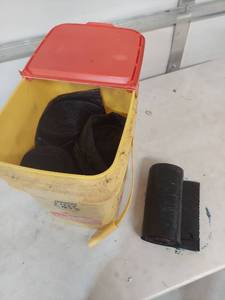 lot 1264 image: Black Plastic Trash Bags - Bulk Lot in Container