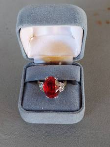 lot 2010 image: Ring With Oval Red Stone in Box