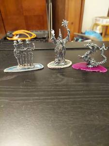 lot 2122 image: 3 Miniature Figurines on Polished Geode Bases - Skeletons, Wizard, Dragon
