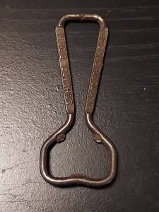 lot 2132 image: Schlitz Bottle Opener