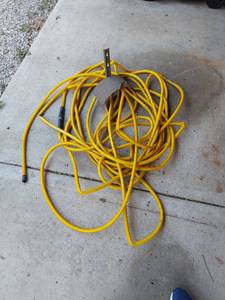 lot 2173 image: 2 Yellow Hose with Wall Mount Bracket
