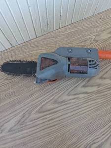 lot 1013 image: Remington Branch Wizard Pole Saw