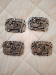 lot 1117 image: Ames Tools Mount Rushmore Belt Buckles Set of 4