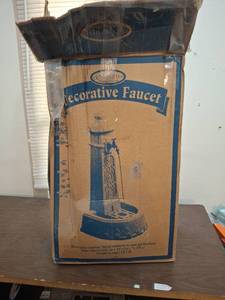 lot 1192 image: Paradiso Decorative Faucet Garden Hose Connection