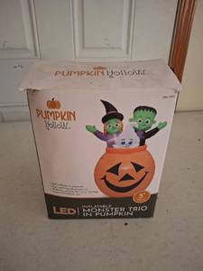 lot 1342 image: Pumpkin Hollow LED Inflatable Monster Trio in Pumpkin 5 Tall