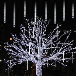 lot 3028 image: LJLNION Meteor Shower Lights, 12 Inch Outdoor Icicle Christmas Lights, 8 Tubes 288 LED Iciclelights Snow Falling Light, Connectable Raindrop Light, Xmas Wedding Party Tree Holiday Decor, White