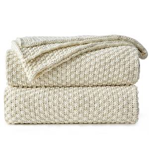 lot 1364 image: Longhui bedding 100% Cotton Knitted Throw Blanket Cream, Soft & Cozy, Machine Washable, 51x63 Perfect for Living Room, Couch, Sofa, Bed or Travel - Retail $30