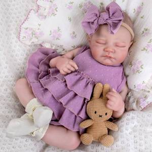lot 1396 image: UOFTKIZ Realistic Newborn Reborn Baby Dolls - 20 Lifelike Girl Baby Dolls, Sleeping Newborn Baby Doll Cloth Body, Gift for Kids 3, Grandma, New-Parents, Collectors - Retail $40