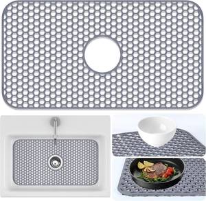 lot 13470 image: Sink Protectors Mat - 25.79x13.98 Kitchen Sink Pad for Bottom of Basin for Protection of Stainless Steel and Tableware, Farmhouse Rubber Basin Mat Protector with Center Drain - Light Gray - Retail $23