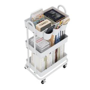 lot 60620 image: Boeeoan 3-Tier Utility Cart with Wheels, Rolling Cart with 3 Hanging Baskets, Storage Shelves, Multi-Functional Organizer Cart for Bathroom, Office, Kitchen, White - Retail $25