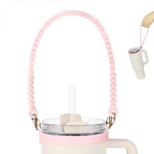 lot 7245 image: VIKIZUES Water Bottle Handle - Soft Silicone Water Bottle Holder, Sling, Lanyard, Carrier with Strap - Fits Most 8-40oz Water Bottles - Compatible Stanley Cup Accessories (Pink) - Retail $9