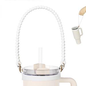 lot 7284 image: VIKIZUES Water Bottle Handle - Soft Silicone Holder, Sling, Lanyard with Strap - Fits Most 8-40oz Bottles - Compatible Stanley Cup Accessories (White) - Retail $9