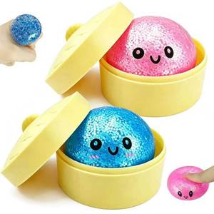 lot 7299 image: 2 Pack Mini Dumpling Squishy Fidget Toys, Glitter & Bead Filled Stress Balls, Soft Slow Rising TPR Smiley Squeeze Toy, Tear-Resistant Sensory Toy for Stress Relief, Party Favors (Pink & Blue) - Retail $15