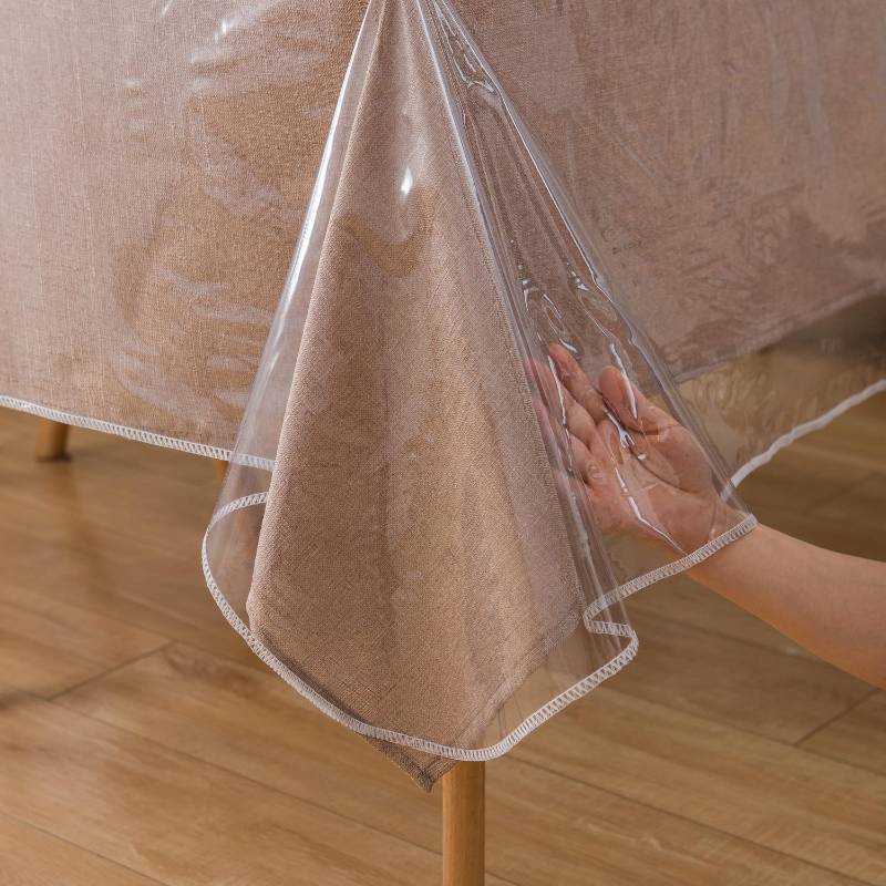 lot 6280 image: Pioggia Clear Heavy Duty Vinyl Tablecloth with Sewn Finished Edges Rectangle Waterproof Oil-Proof Stain Resistant Plastic Table Cover Protector (60 x 120 Inch)