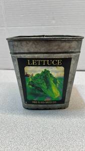lot 6899 image: Red Shed Seed Co. Lettuce Seed Metal Planter Pot
