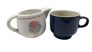 lot 7053 image: Four Seasons Ceramic Pitcher and navy blue mug