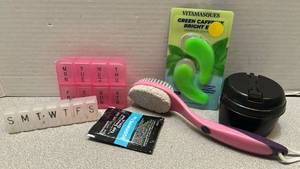 lot 7776 image: Beauty Care Lot Pill Organizer Eye Patches Facial Brush Skincare