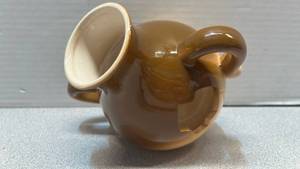 lot 7797 image: Ceramic  browncream base sculpture