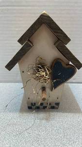 lot 7799 image: Wooden Birdhouse with wooden heart and checkered design