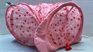 lot 7807 image: Pink Heart Print Play Tunnel with heart  Toy