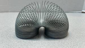 lot 7819 image: Metal Slinky Spring Toy