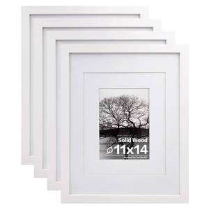 lot 18885 image: Egofine 11x14 Picture Frames Set of 2, Made of Solid Wood Covered by Plexiglass 5x7 and 8x10 with Mat or 11x14 without Mat, for Table Top Display and Wall Mounting Photo Frame White - Retail $40