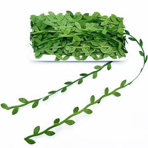 lot 255 image: AMZFULY 66 Ft Artificial Vines,Green Leaf Gift Wrapping Trim Ribbon,Eucalyptus Leaves Garland Wreath Accessory DIY Craft Party Wedding Home Decoration - Retail $5