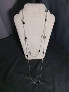 lot 3998 image: Long Station Necklace with Black Beads and Textured Charms