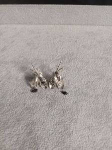 lot 6368 image: Pair of Metallic Earrings with Black Stone Details