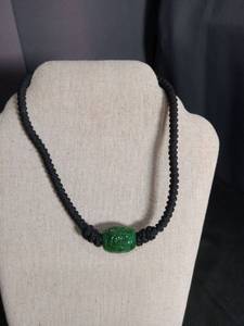 lot 6370 image: Green Carved Pendant Necklace Black Cord