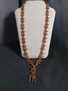 lot 6443 image: Beaded Necklace with Brass Spacers Red Green Beads Long Drop Pendant